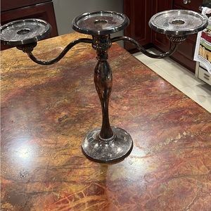 Pottery barn candelabra holds big candles gorgeous centerpiece.